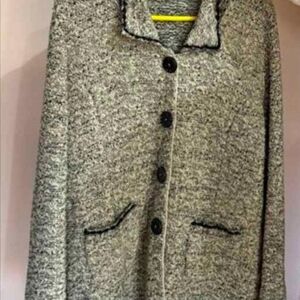 Beautiful button up, long sweater cardigan with pretty soft trim. Size Large